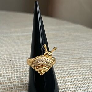 Adjustable pavé covered gold snail ring